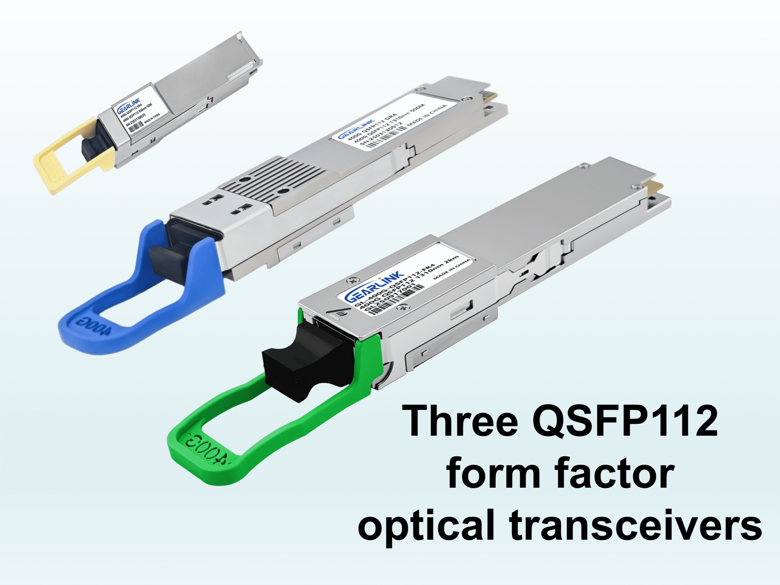 Three QSFP112 form factor optical transceivers